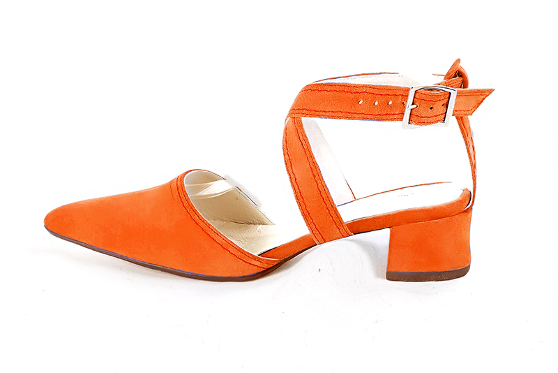 Clementine orange women's open back shoes, with crossed straps. Tapered toe. Low flare heels. Profile view - Florence KOOIJMAN